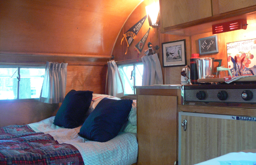The sleeping area in an old travel trailer.