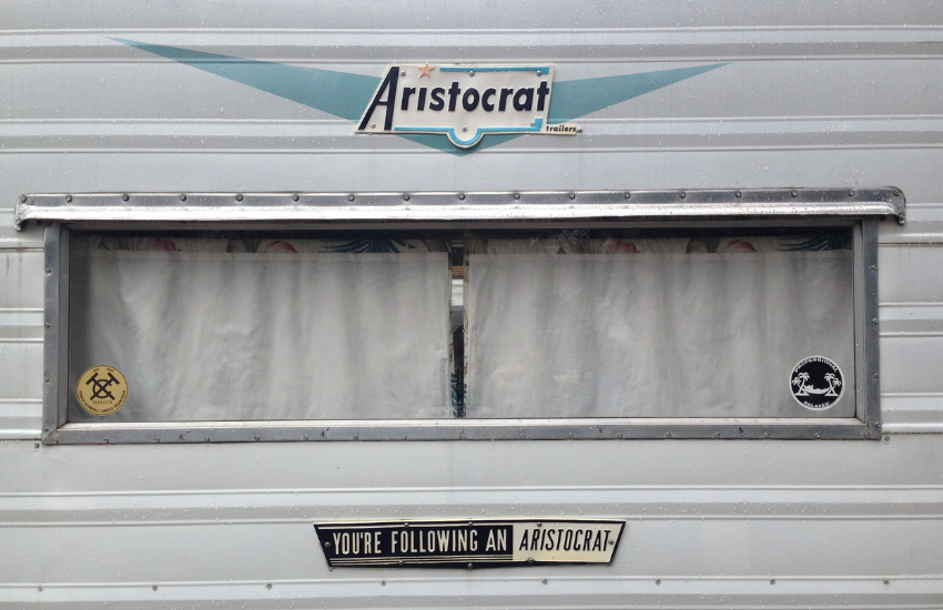 Rear of a vintage camper trailer.