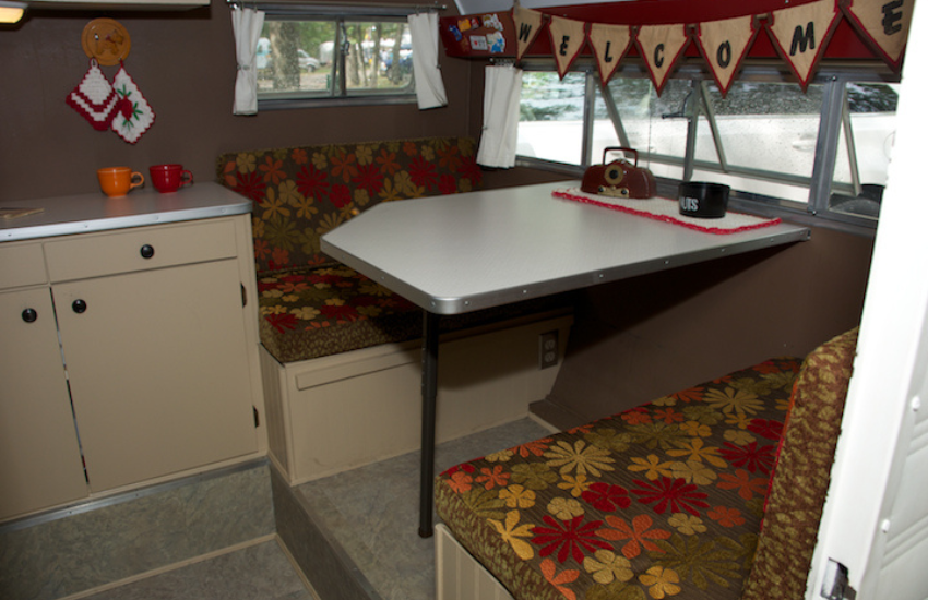 Camper Decor Ideas#12 Flower pattened dinette cushions in an old camper.