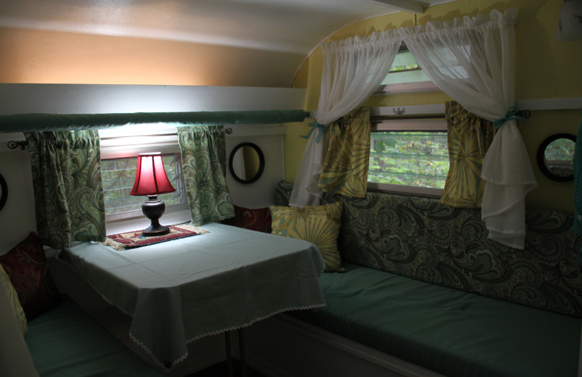 Camper Decor Ideas#19 Pastel shades and floral patterns in a camper.