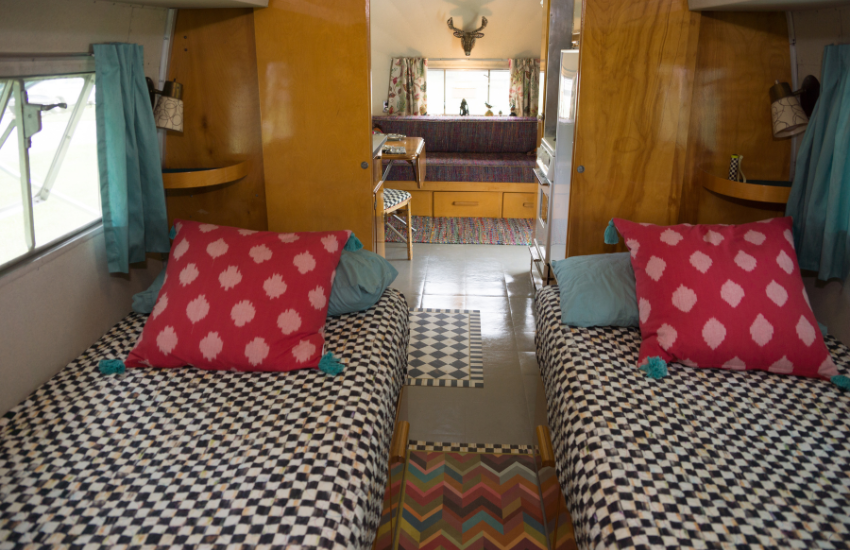 Camper Decor Ideas#20 Multi colored pattens and color in a vintage trailer.
