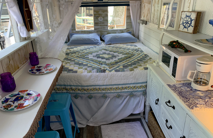 Camper Decor Ideas#22 Pastel colors and vintage furniture in an old trailer.