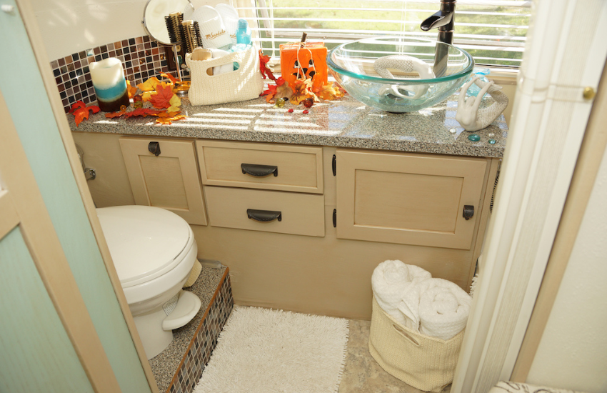Camper Decor Ideas#23 Pastel colored camper decor in an RV bathroom.