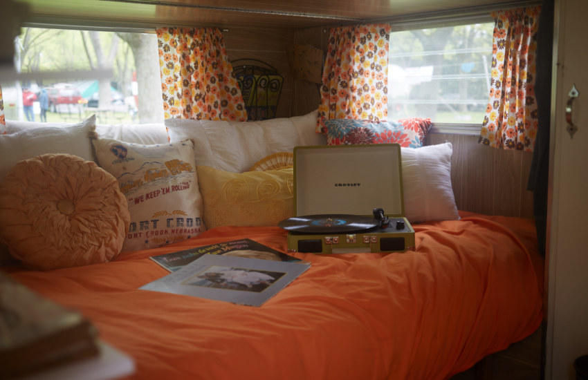Camper Decor Ideas#25 Orange colored camper decor in an old trailer.