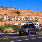 10 Pop Up Truck Bed Campers for Adventure Lovers A truck bed camper on a tarmac road.