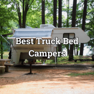 A truck bed camper at a campground.