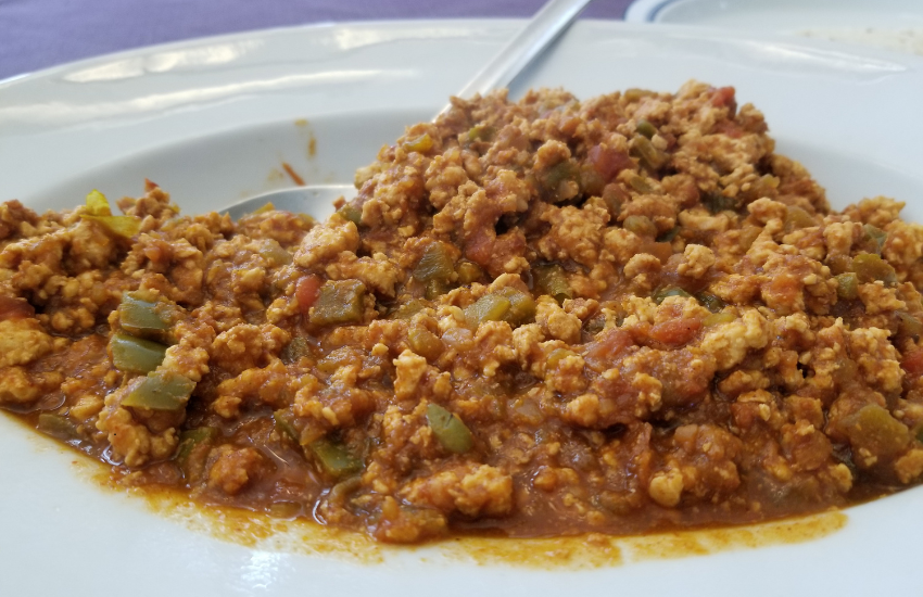 A bowl with taco meat.